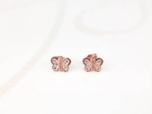 BROQUEL RECUBRIMIENTO DE ORO ROSA MARIPOSA ZIRCONIA