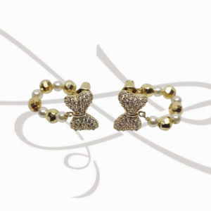 BROQUEL ORO LAMINADO FIGURA MOÑO AZUCARADO